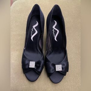 Nina black satin pumps. New